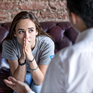 Foto: Psychologische Beratung einer jungen Dame